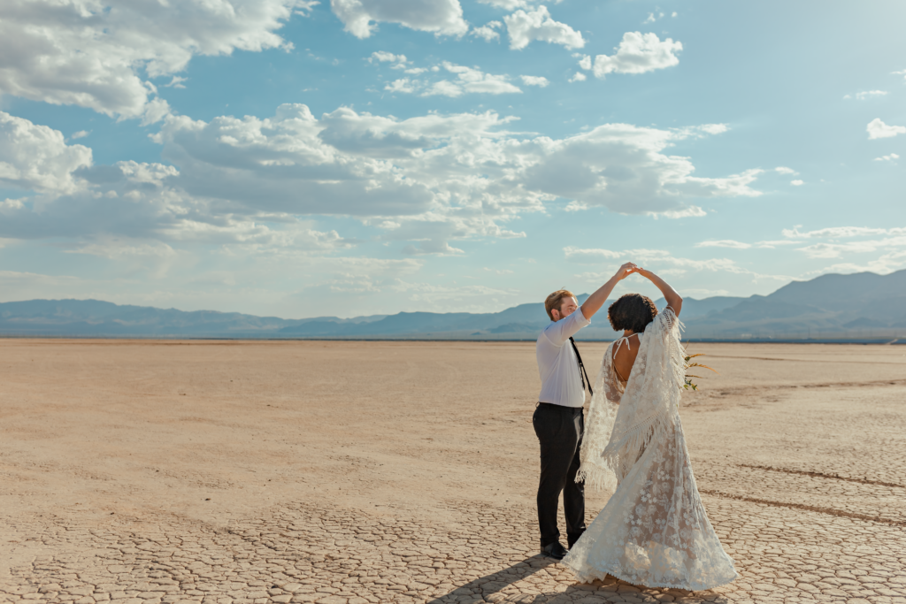 Documentary-Style Wedding Photographer. couple dancing Dry Lake Bed Las Vegas Nevada