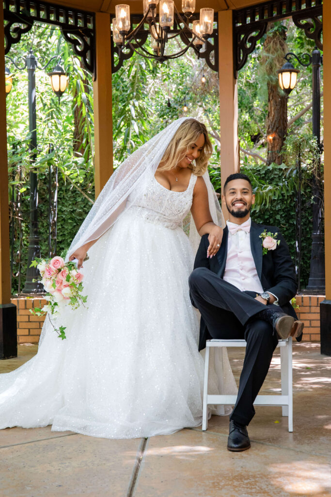 Bride and Groom taking pictures at the regency Garden wedding venue in Mesa Arizona